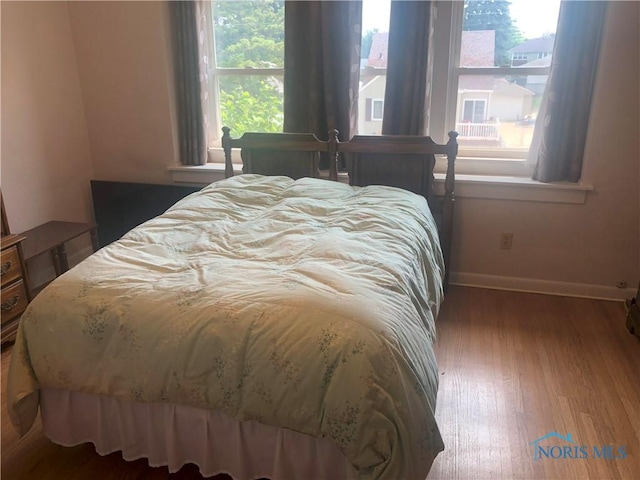 4815 298th St, Toledo, OH 43611 - bedroom with wood finished floors