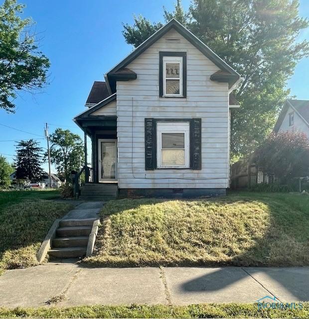 522 Oswald St, Toledo, OH 43605 - view of front of property with a front yard