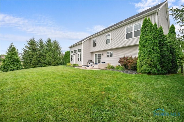 9258 Nate Ct, Sylvania, OH 43560 - back of house with a yard, an outdoor hangout area, and a patio area