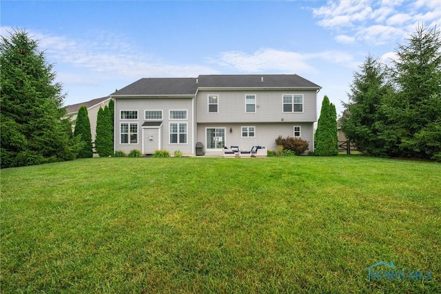 9258 Nate Ct, Sylvania, OH 43560 - rear view of property featuring a lawn, a patio, and french doors