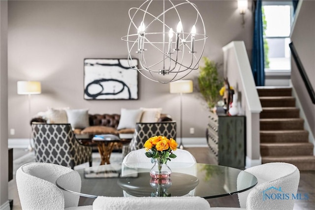 9258 Nate Ct, Sylvania, OH 43560 - dining room with a chandelier and stairs