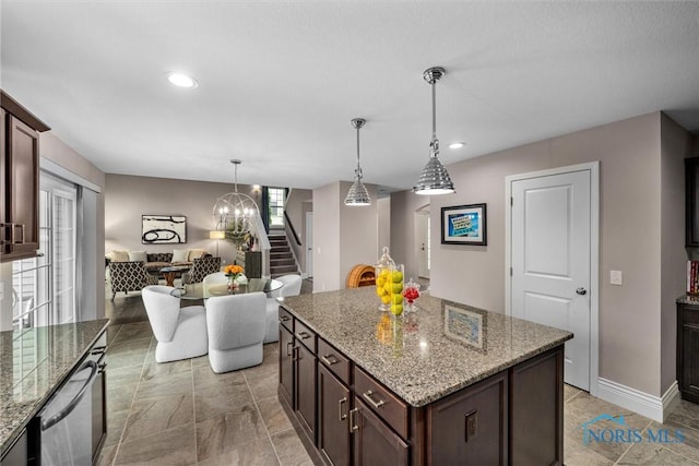 9258 Nate Ct, Sylvania, OH 43560 - kitchen with dishwasher, decorative light fixtures, a center island, dark brown cabinets, and recessed lighting