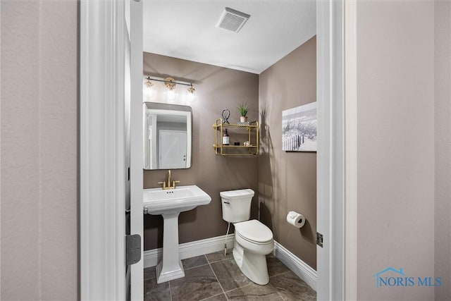 9258 Nate Ct, Sylvania, OH 43560 - bathroom featuring toilet and tile patterned flooring