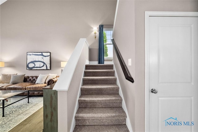 9258 Nate Ct, Sylvania, OH 43560 - staircase featuring baseboards