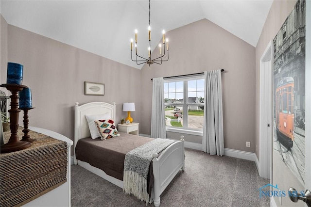 9258 Nate Ct, Sylvania, OH 43560 - carpeted bedroom featuring a chandelier and high vaulted ceiling