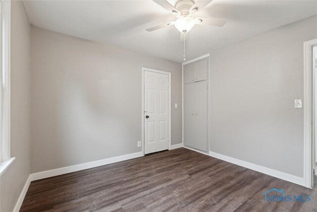 2713 Stateview Dr, Toledo, OH 43609 - unfurnished room featuring ceiling fan and dark wood-type flooring