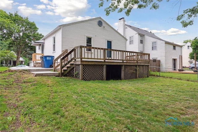 2713 Stateview Dr, Toledo, OH 43609 - back of house with a wooden deck and a chimney