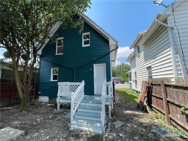 1221 E Broadway St, Toledo, OH 43605 - back of house with a wooden deck