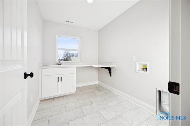 2700 Cross Ridge Way, Perrysburg, OH 43551 - laundry area with light marble finish flooring, cabinet space, and hookup for a washing machine