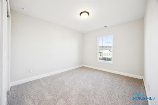 2700 Cross Ridge Way, Perrysburg, OH 43551 - carpeted empty room featuring baseboards and a smoke detector
