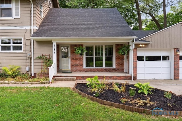 1673 Watova Rd, Toledo, OH 43614 - view of front of property featuring an attached garage, a porch, brick siding, roof with shingles, and concrete driveway