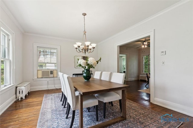1673 Watova Rd, Toledo, OH 43614 - dining room featuring cooling unit, radiator, healthy amount of natural light, a chandelier, and crown molding