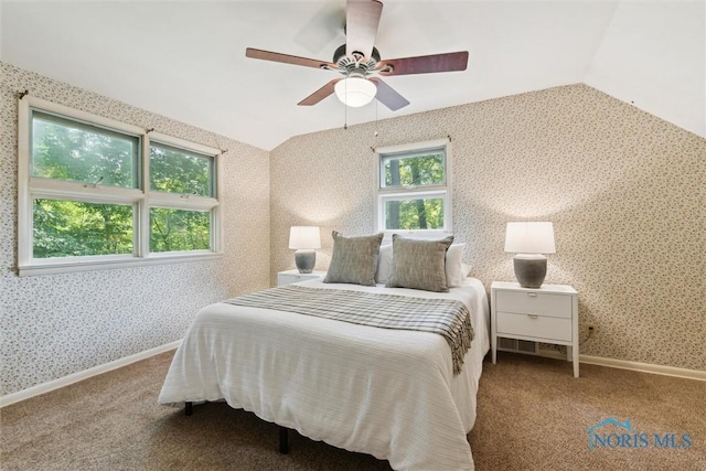 1673 Watova Rd, Toledo, OH 43614 - carpeted bedroom with vaulted ceiling, ceiling fan, and wallpapered walls