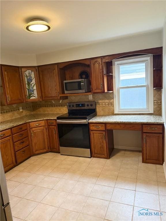 125 E Yates Ave, Findlay, OH 45840 - kitchen featuring appliances with stainless steel finishes, backsplash, and open shelves