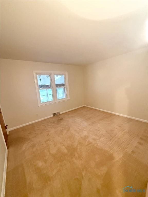 125 E Yates Ave, Findlay, OH 45840 - unfurnished room featuring light colored carpet