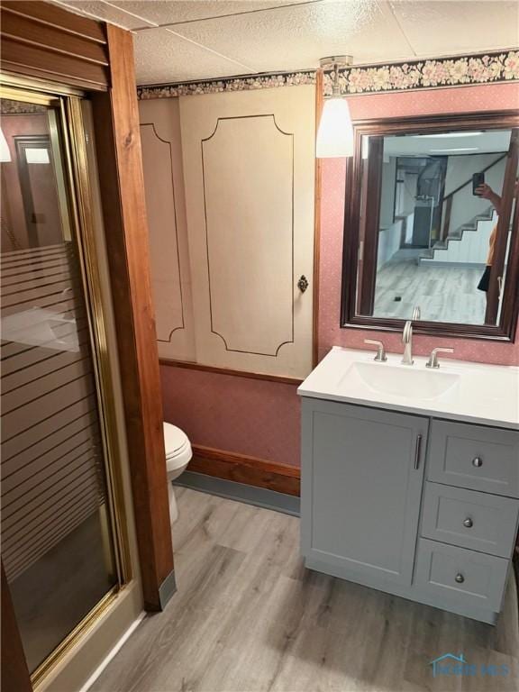 125 E Yates Ave, Findlay, OH 45840 - bathroom with wood finished floors, vanity, and a stall shower