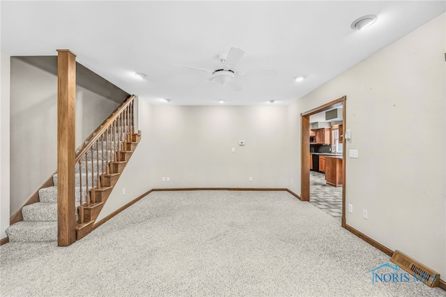 21010 Lemoyne Rd, Luckey, OH 43443 - finished basement featuring carpet floors, stairs, and a ceiling fan