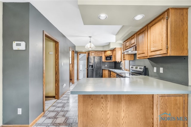 21010 Lemoyne Rd, Luckey, OH 43443 - kitchen with refrigerator with ice dispenser, electric range, black microwave, under cabinet range hood, and a peninsula