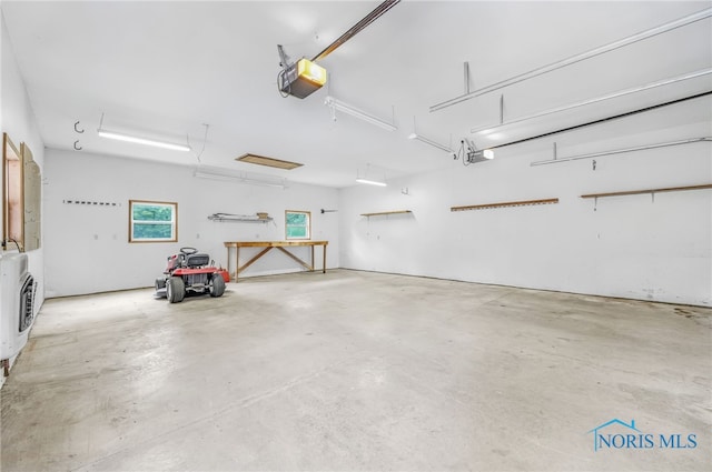 21010 Lemoyne Rd, Luckey, OH 43443 - garage featuring a garage door opener