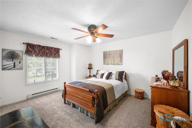 14 White Tail Way Unit A, Norwalk, OH 44857 - carpeted bedroom with a baseboard heating unit and a ceiling fan