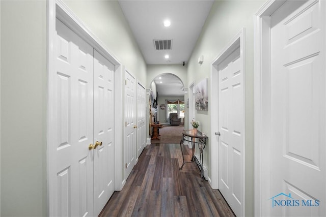 14 White Tail Way Unit A, Norwalk, OH 44857 - corridor featuring arched walkways, dark wood-style flooring, and recessed lighting