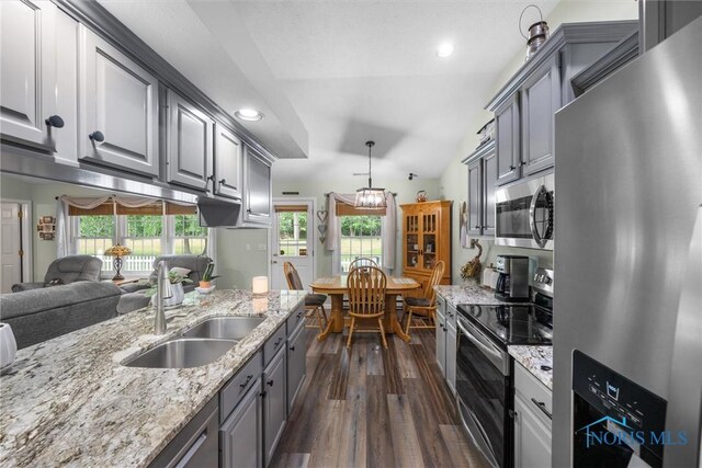 14 White Tail Way Unit A, Norwalk, OH 44857 - kitchen with appliances with stainless steel finishes, dark wood-style floors, gray cabinets, recessed lighting, and light stone counters