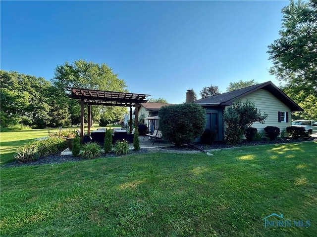 210 Duck Pond Rd, Upper Sandusky, OH 43351 - back of property with a pergola, a lawn, a patio area, and a chimney