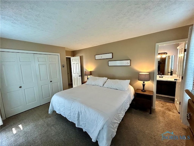 210 Duck Pond Rd, Upper Sandusky, OH 43351 - carpeted bedroom featuring a closet, a textured ceiling, and ensuite bath