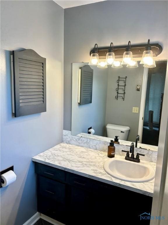 210 Duck Pond Rd, Upper Sandusky, OH 43351 - bathroom featuring vanity and toilet