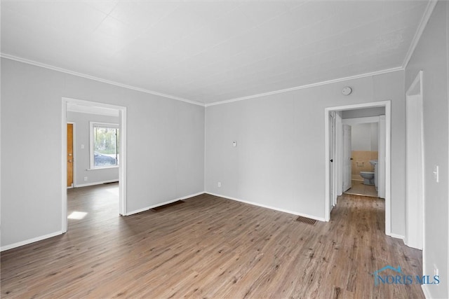5520 N Summit St, Toledo, OH 43611 - spare room with crown molding, wood finished floors, and a smoke detector