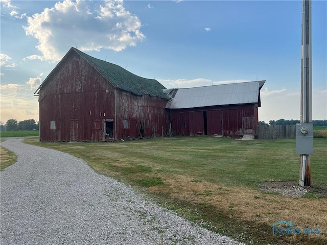8872 Rd 87, Paulding, OH 45879 - view of barn with a lawn and driveway