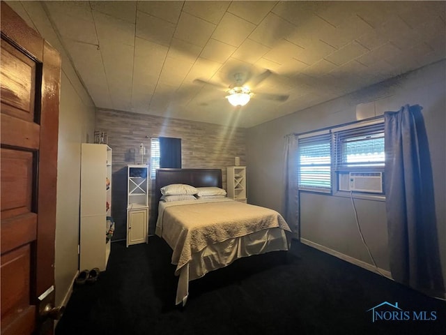 8872 Rd 87, Paulding, OH 45879 - bedroom with dark carpet, cooling unit, and a ceiling fan