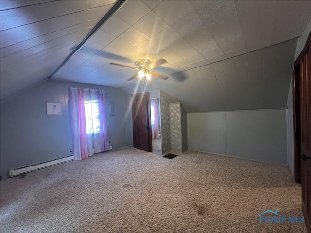 8872 Rd 87, Paulding, OH 45879 - bonus room with a baseboard radiator, vaulted ceiling, a ceiling fan, and carpet
