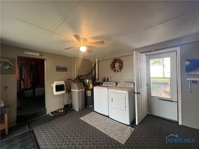 8872 Rd 87, Paulding, OH 45879 - washroom featuring washing machine and clothes dryer, dark colored carpet, heating unit, and ceiling fan