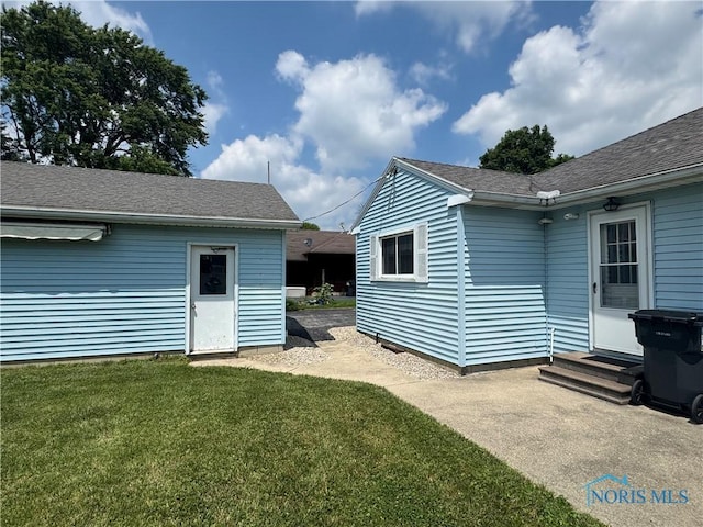 1926 Tiffin Rd, Fremont, OH 43420 - view of green lawn with entry steps