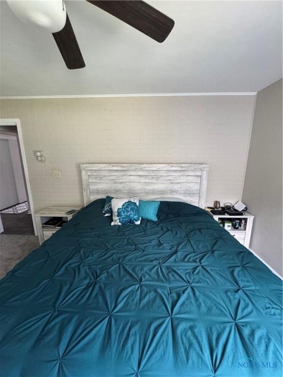 1926 Tiffin Rd, Fremont, OH 43420 - bedroom with a ceiling fan and carpet