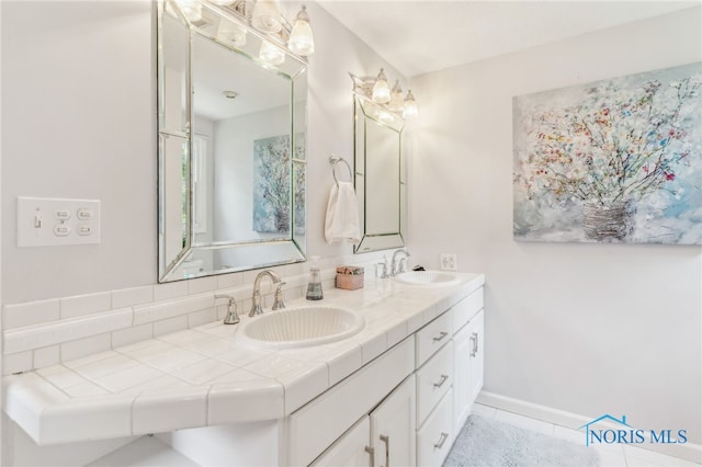 618 Sutton Pl, Findlay, OH 45840 - bathroom with double vanity and tile patterned flooring