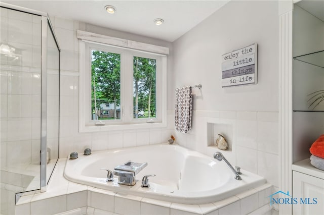 618 Sutton Pl, Findlay, OH 45840 - bathroom with a bath and a stall shower