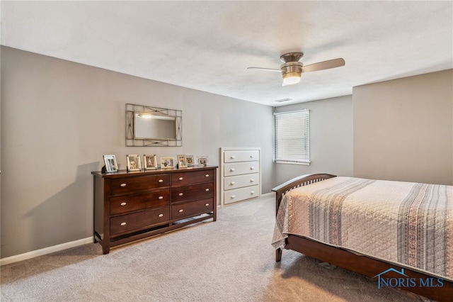 618 Sutton Pl, Findlay, OH 45840 - carpeted bedroom featuring a ceiling fan and baseboards