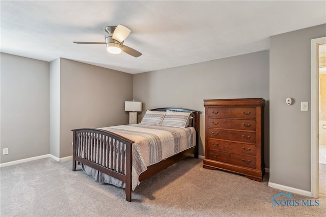 618 Sutton Pl, Findlay, OH 45840 - carpeted bedroom featuring ceiling fan and baseboards