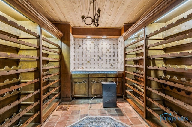 618 Sutton Pl, Findlay, OH 45840 - wine area with wood ceiling, wallpapered walls, and a chandelier