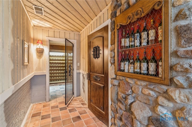 618 Sutton Pl, Findlay, OH 45840 - wine room with wooden ceiling and tile patterned flooring