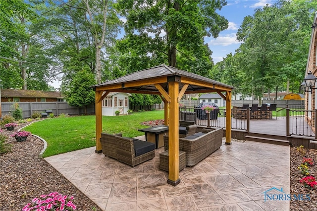618 Sutton Pl, Findlay, OH 45840 - fenced backyard with a gazebo, an outdoor hangout area, a deck, and a patio