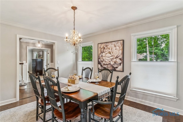 618 Sutton Pl, Findlay, OH 45840 - dining area featuring a chandelier, crown molding, and wood finished floors