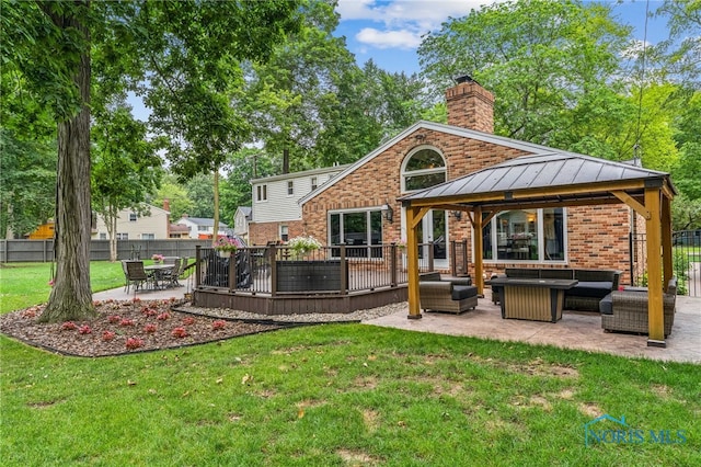 618 Sutton Pl, Findlay, OH 45840 - rear view of house with an outdoor hangout area, brick siding, a gazebo, a standing seam roof, and a chimney