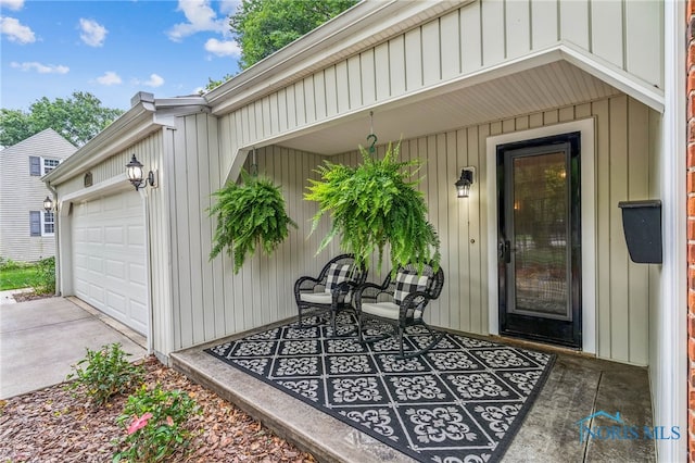 618 Sutton Pl, Findlay, OH 45840 - property entrance with a garage and concrete driveway