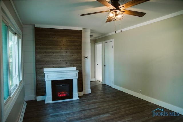 1474 S Clinton St, Defiance, OH 43512 - unfurnished living room featuring ceiling fan, dark wood-style floors, a lit fireplace, ornamental molding, and a baseboard radiator