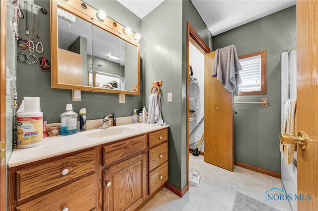 304 Fulton St, Fayette, OH 43521 - full bath with vanity and tile patterned flooring