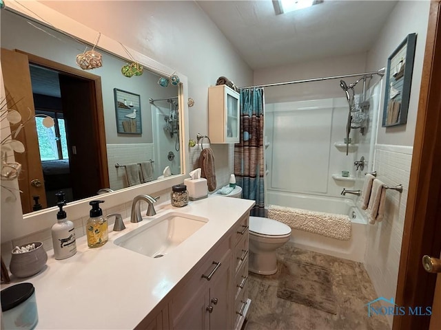 19445 Powers Rd, Defiance, OH 43512 - bathroom featuring shower / tub combo with curtain, vanity, and stone finish flooring