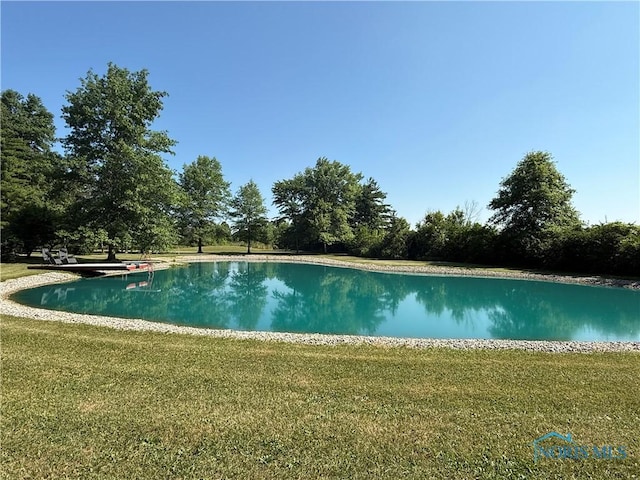 19445 Powers Rd, Defiance, OH 43512 - swimming pool with a yard and a water view